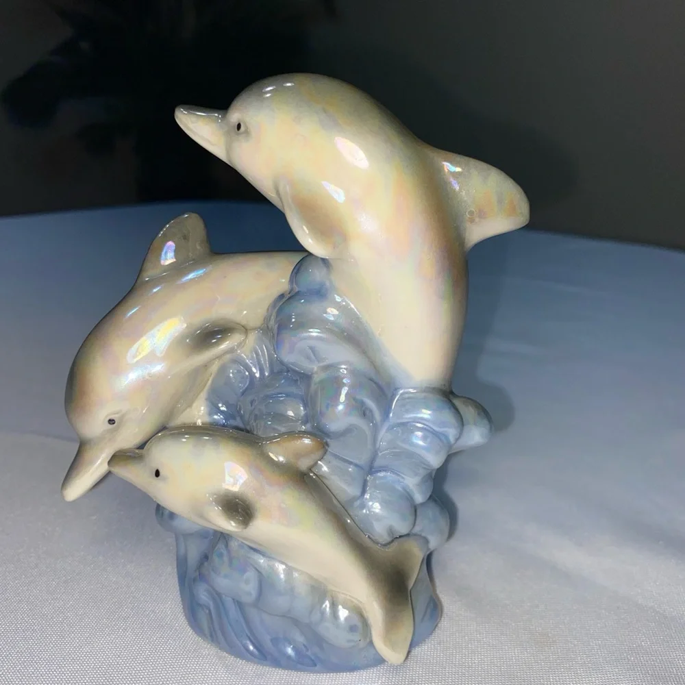 Glazed Ceramic Dolphin Trio on a blue Wave